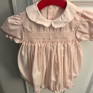 6 mo. Baby girl pink smocked onesie.